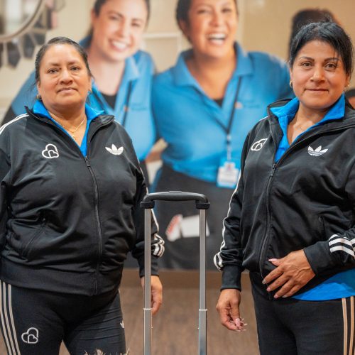 Uniformed Maid Brigade cleaning team with premium cleaning tools, representing professional, reliable, fully trained housecleaning service.