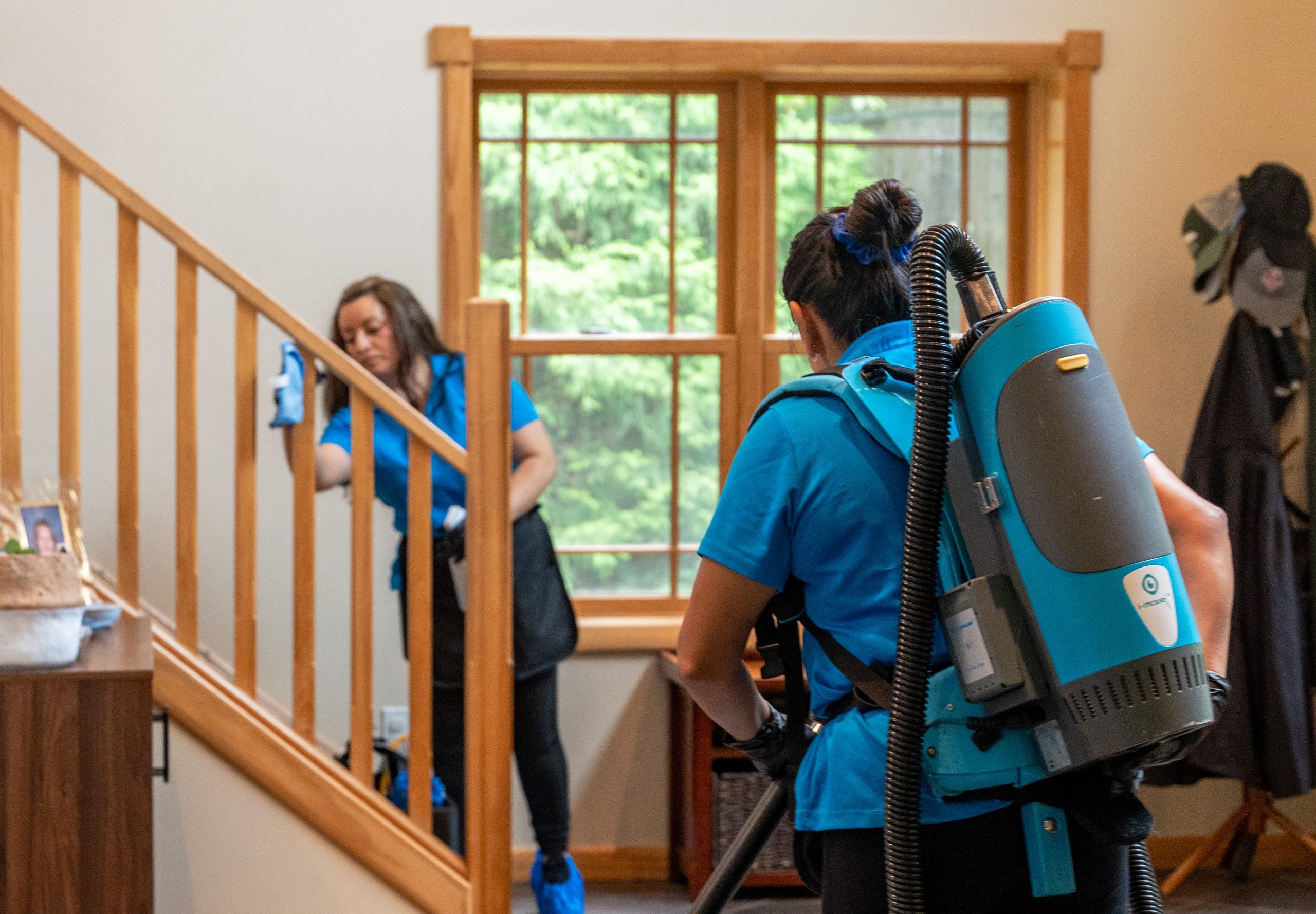 House cleaning team providing recurring cleaning service in residential home